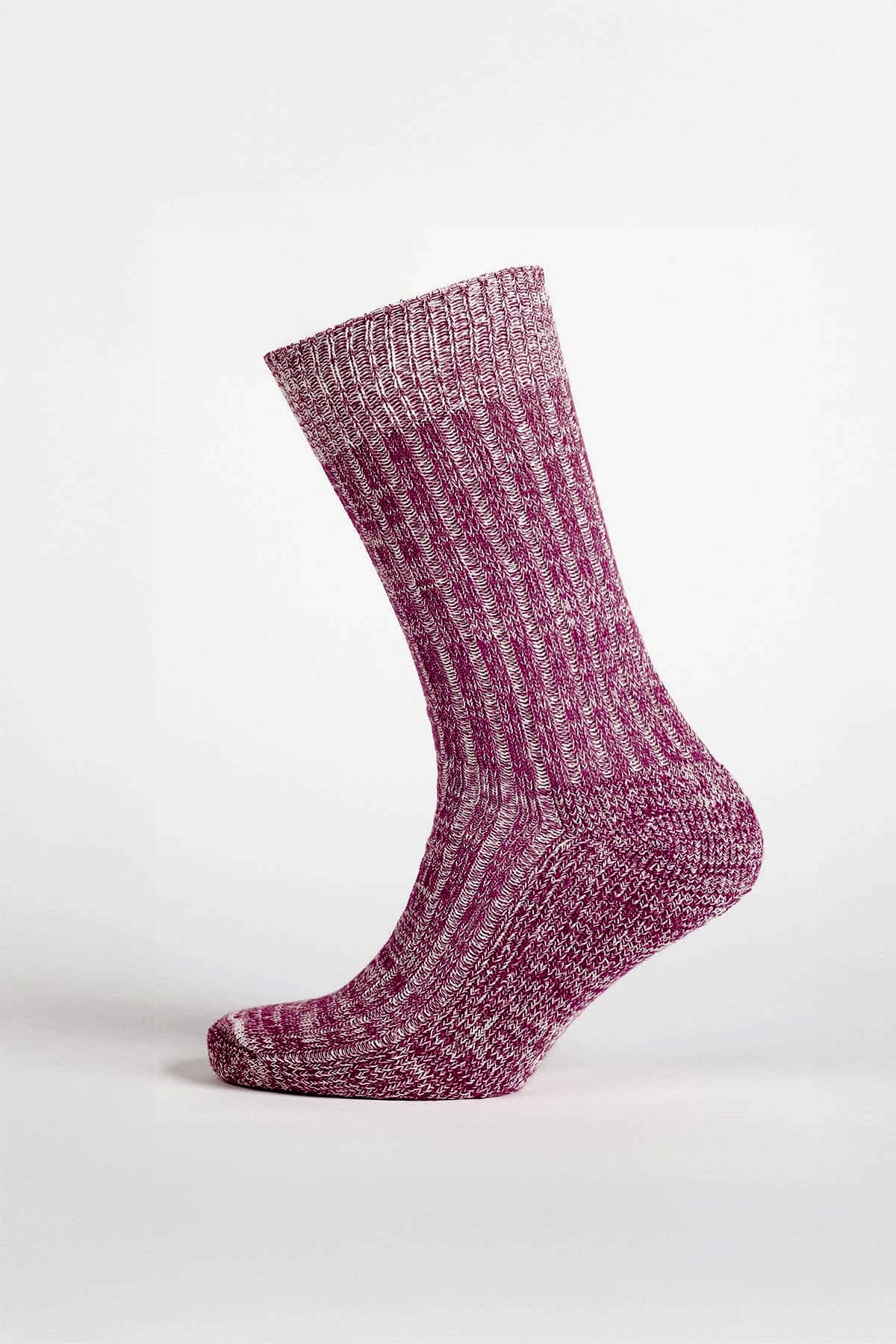 Pink and white sock on a white background